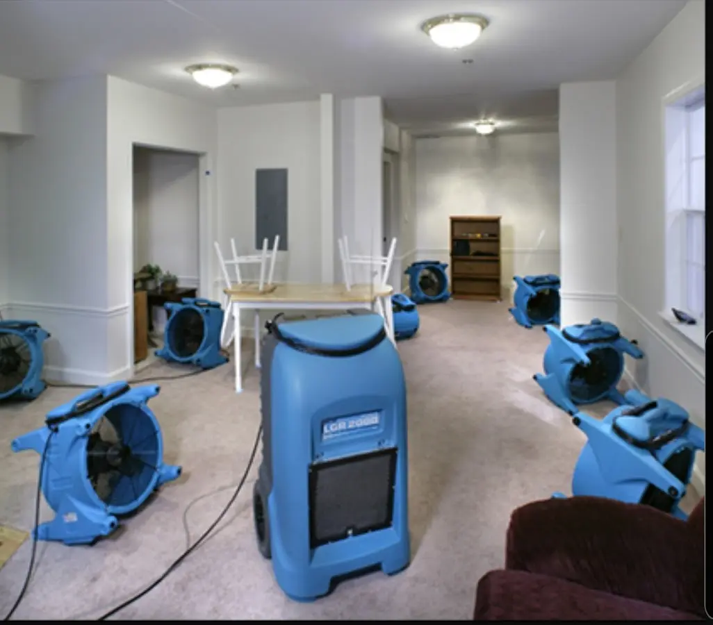Air movers and dehumidifier setup for Water Damage Restoration in Old Westbury